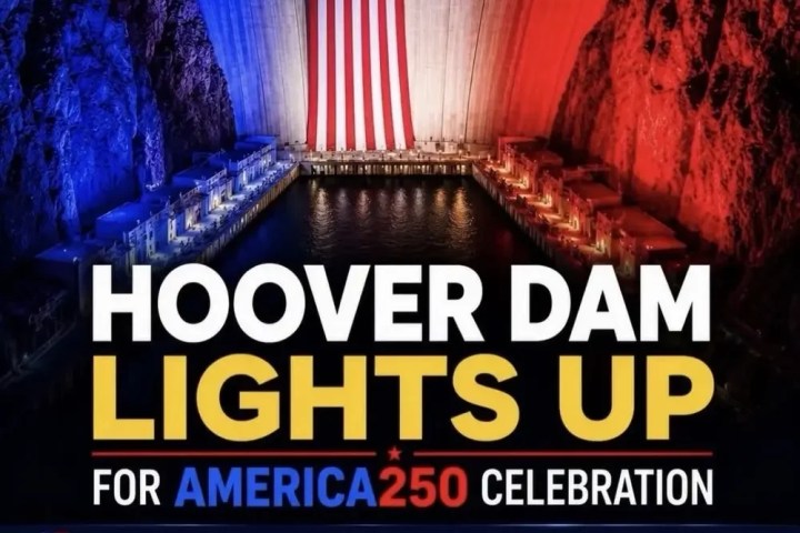 Hoover Dam lit in red, white, and blue for America 250 celebration.